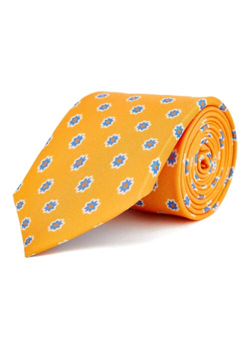 Silk tie in yellow with flower pattern