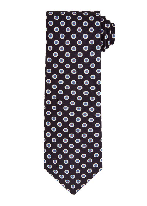 A men's deep navy and blue coloured silk tie with hexagonal pattern.