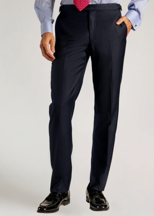 Fine navy herringbone suit trousers in a tailored fit