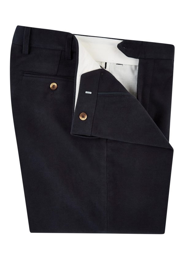 Navy moleskin trousers styled with leather belt