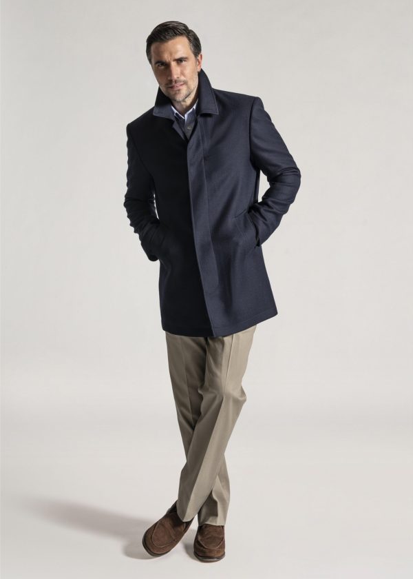 A navy wool three quarter overcoat