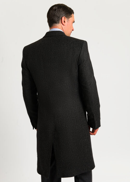 Back of men's grey wool double breasted overcoat.