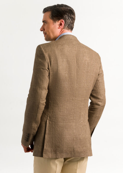 Back of a tan check men's linen jacket featuring two side splits.