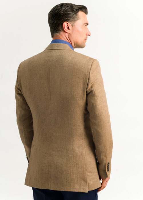 The back of a men's tailored fit tan linen jacket.