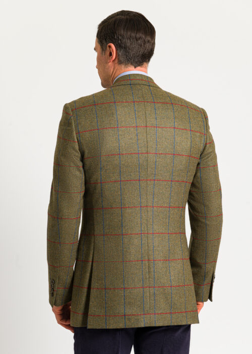 Back of a green, blue and red tweed men's jacket.