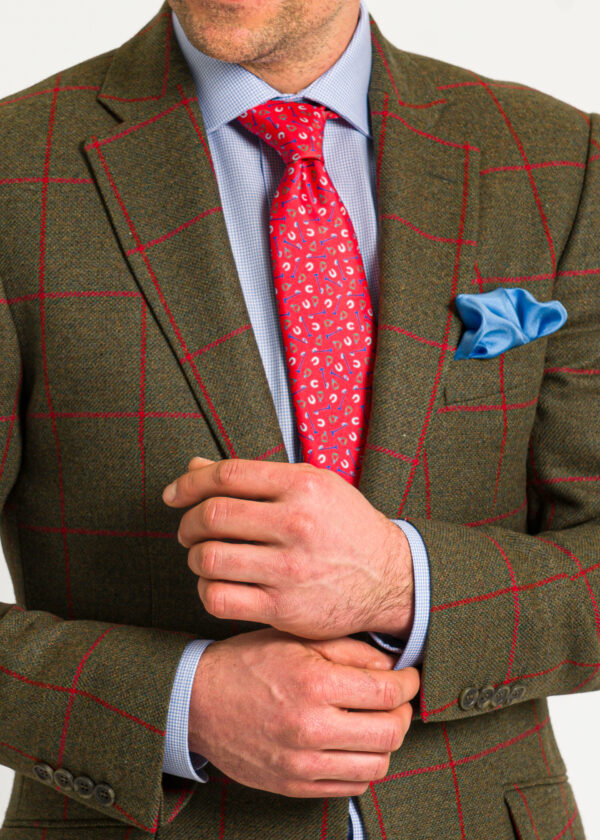 Tailored green tweed wool men's blazer with stunning red windowpane check.