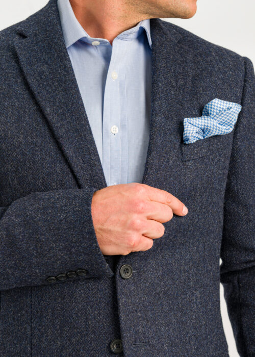 A stylish Roderick Charles navy jacket styled with a pale blue silk pocket square