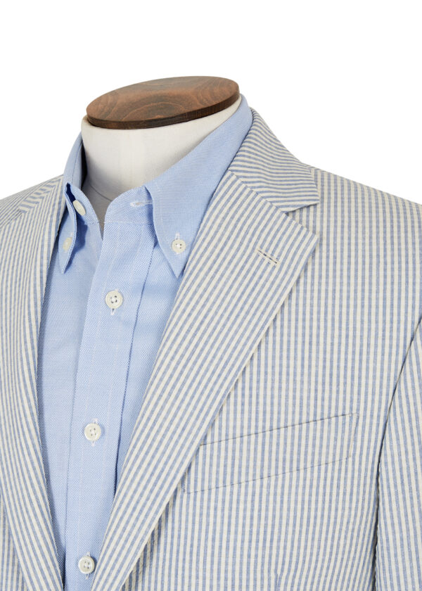 A tailored Roderick Charles light blue seersucker jacket, perfect for spring events