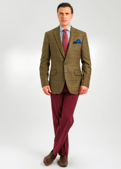 A stylish Roderick Charles green jacket with a red and navy check