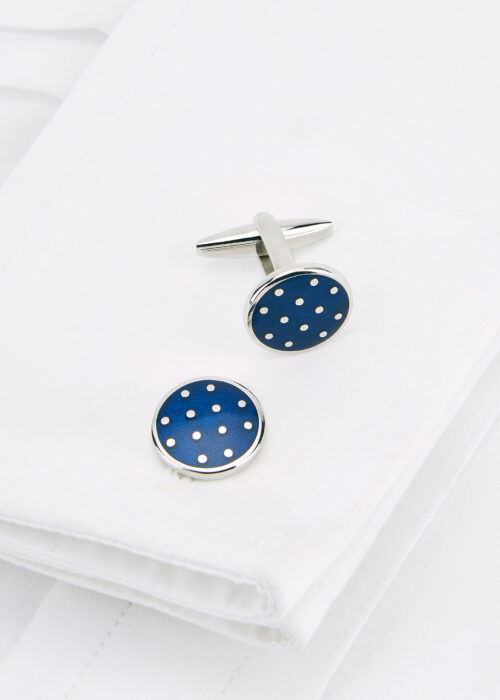 A Roderick Charles royal blue round spot cufflink