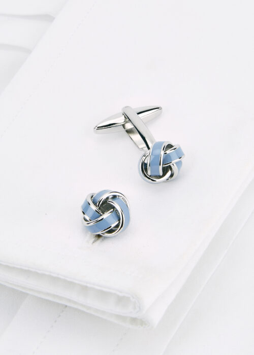 A Roderick Charles pale blue knot cufflink