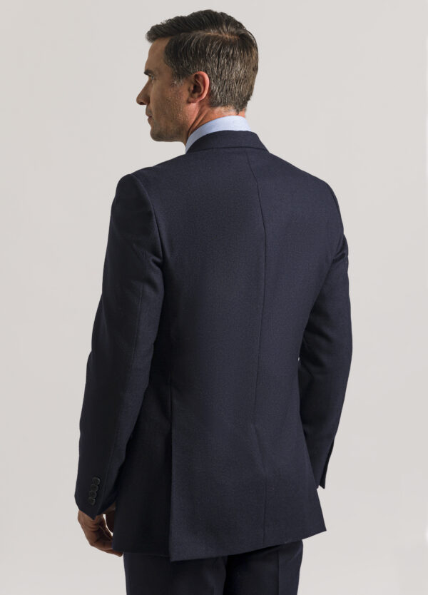 The back of a clean-cut Roderick Charles tailored fit navy hopsack suit