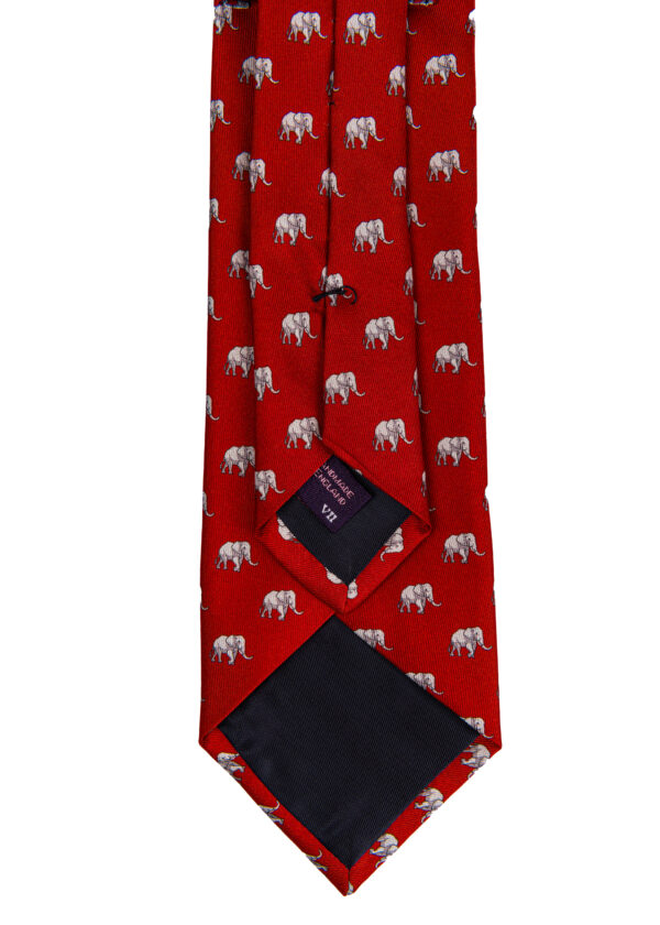 A Roderick Charles red silk business tie with elephants